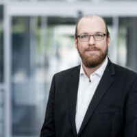 Portraitaufnahme eines Mitarbeiters Portraitaufnahme eines Mitarbeiters